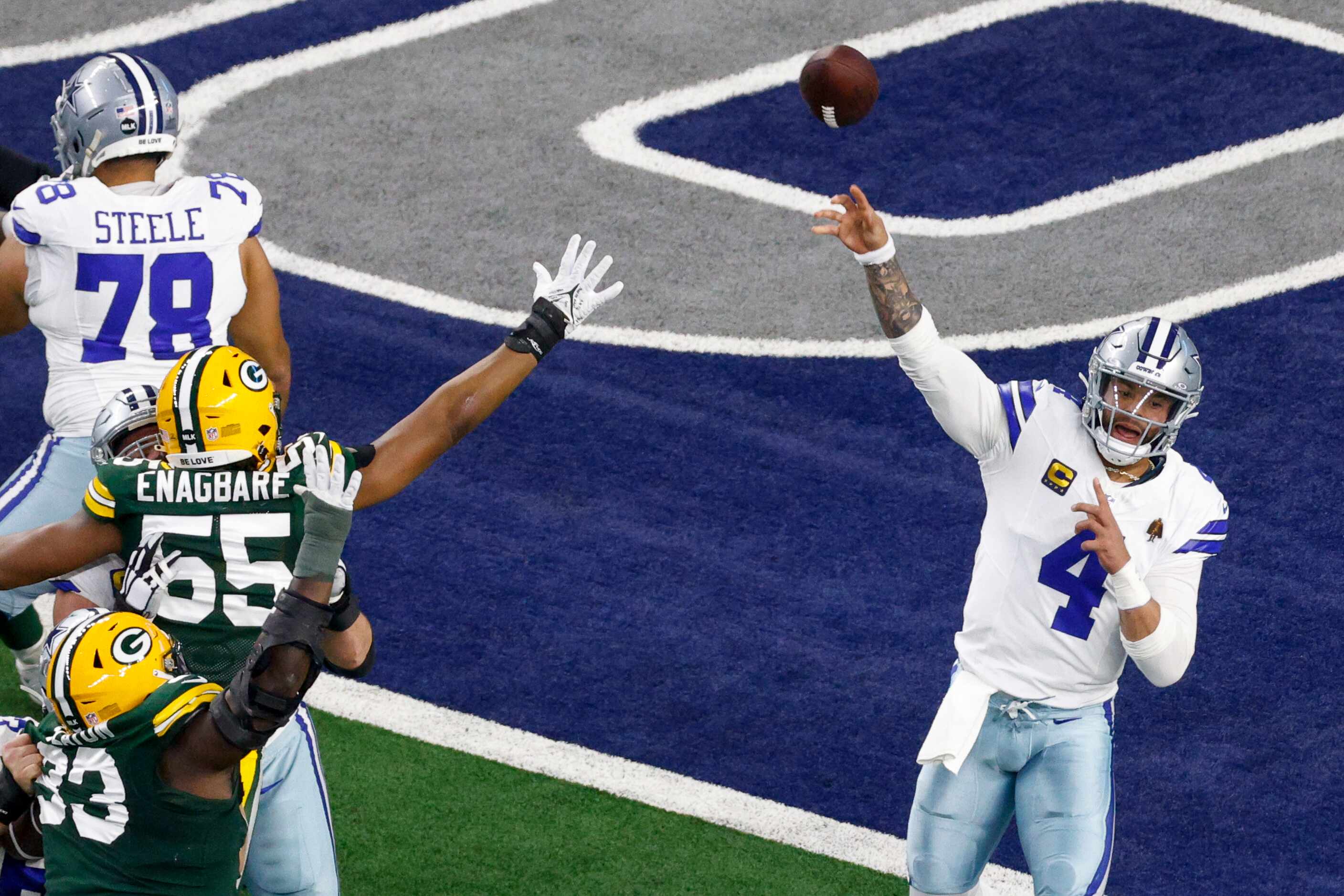 Dallas Cowboys quarterback Dak Prescott (4) throws a pass during the first half of an NFL...