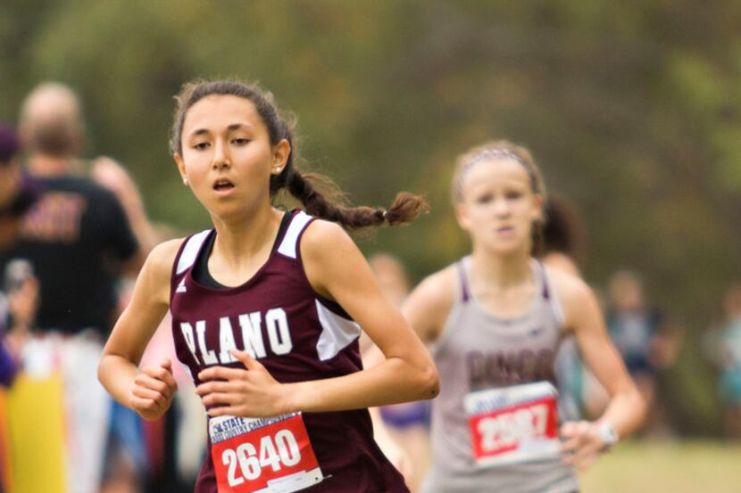 Plano's Ashlyn Hillyard (2640), pictured in a meet last fall, repeated as girls varsity...