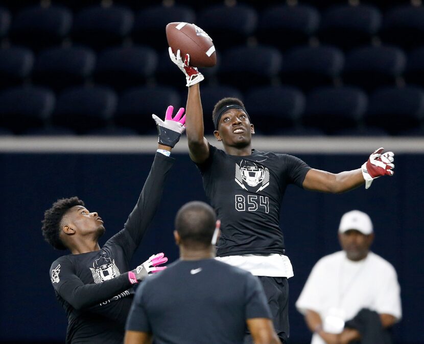 Hebron's Verone McKinley III (854) gets to the ball first as Mesquite Horn's Brodrick...