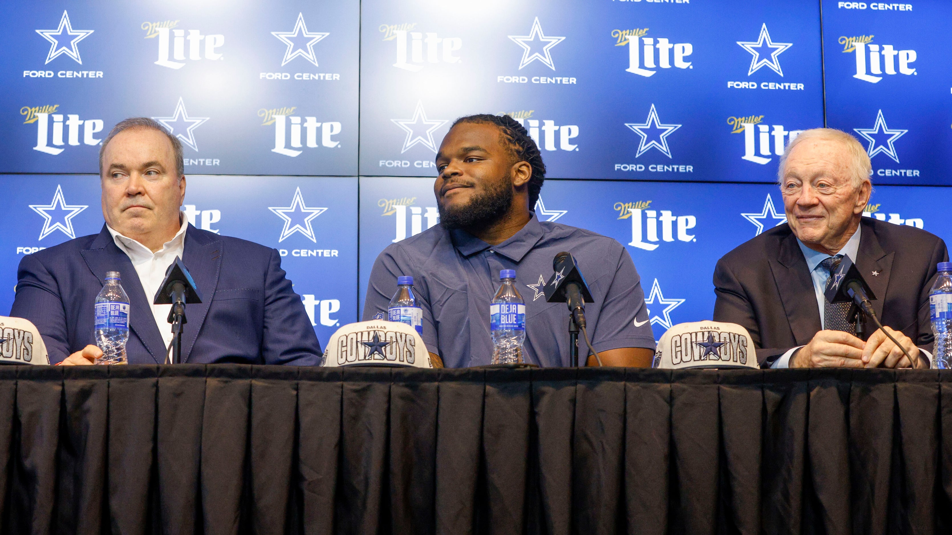 Dallas Cowboys head coach Mike McCarthy (left), rookie defensive tackle Mazi Smith (center)...