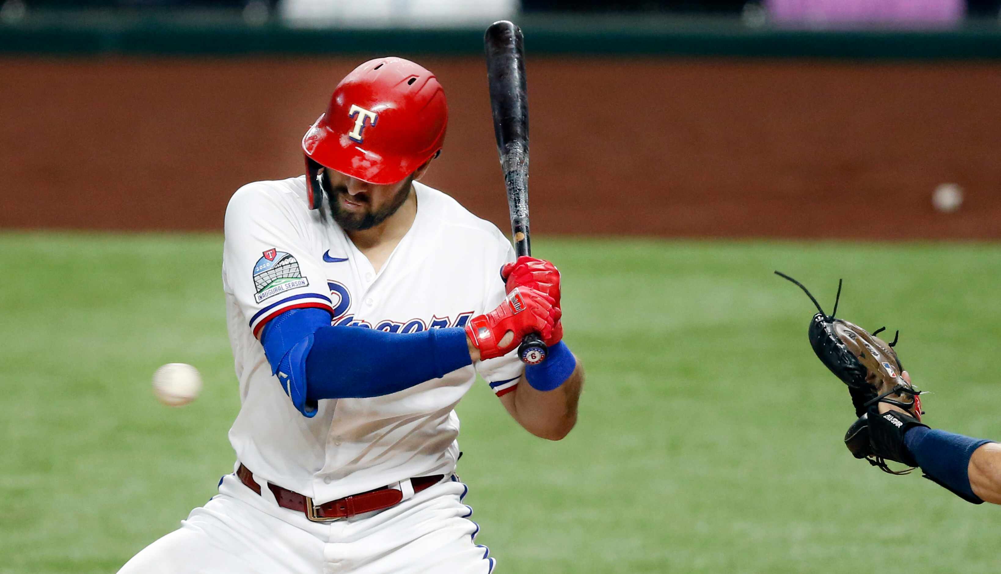 Texas Rangers center fielder Joey Gallo (13) is hit on the arm by a pitch from Seattle...