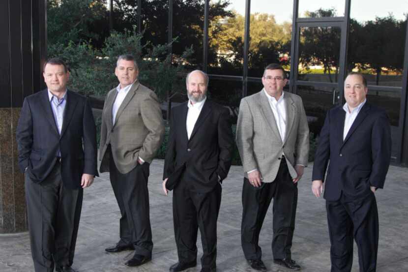 The founders of GuideIT,  left to right: Russell Freeman, Scott Barnes, John Furniss, Tim...