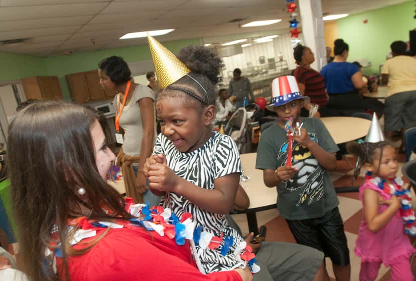 Courtney Underwood helped organize a birthday party for children at Family Gateway in July...