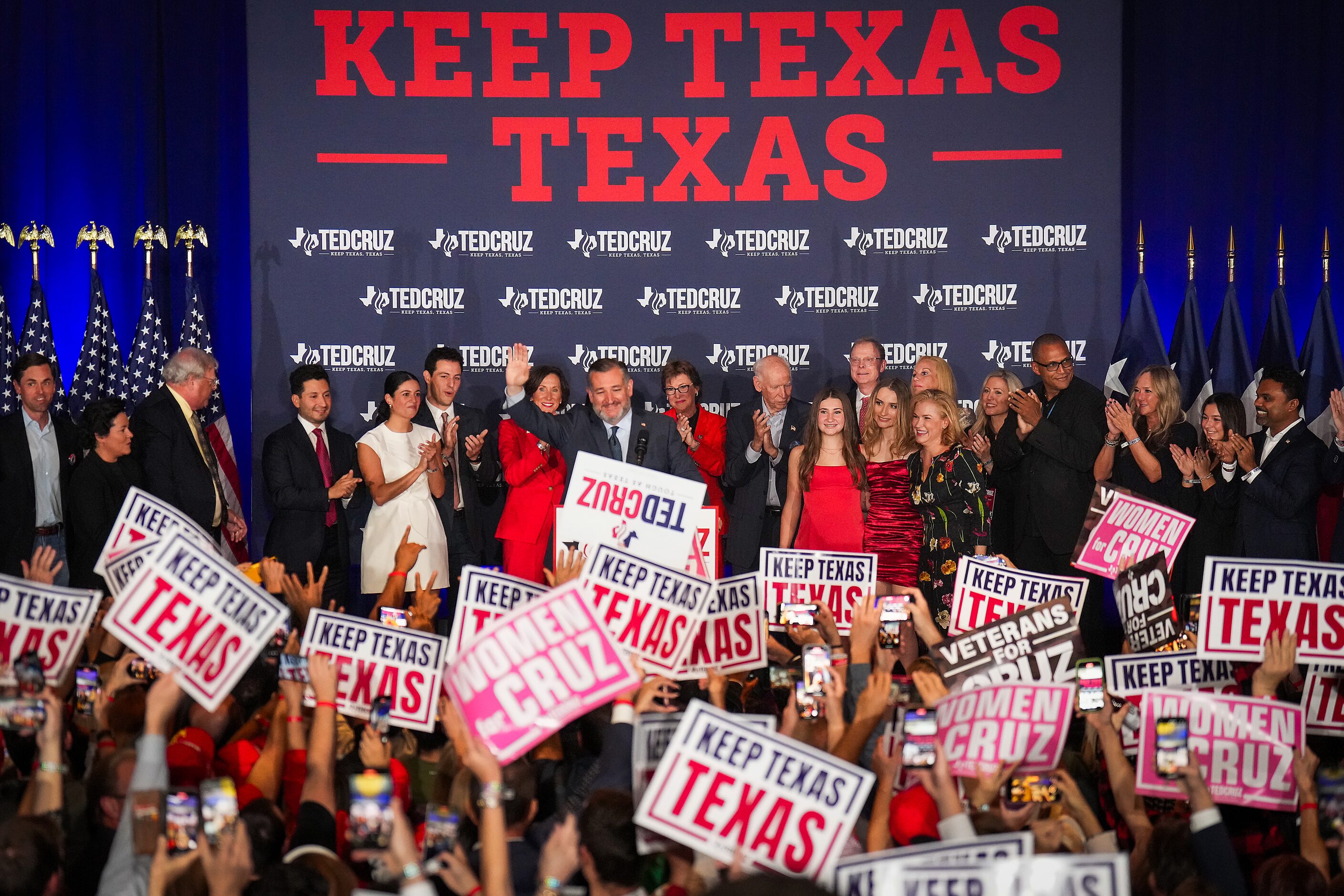 Sen. Ted Cruz, R-Texas, waves to supporters as he takes the stage to declare victory over...