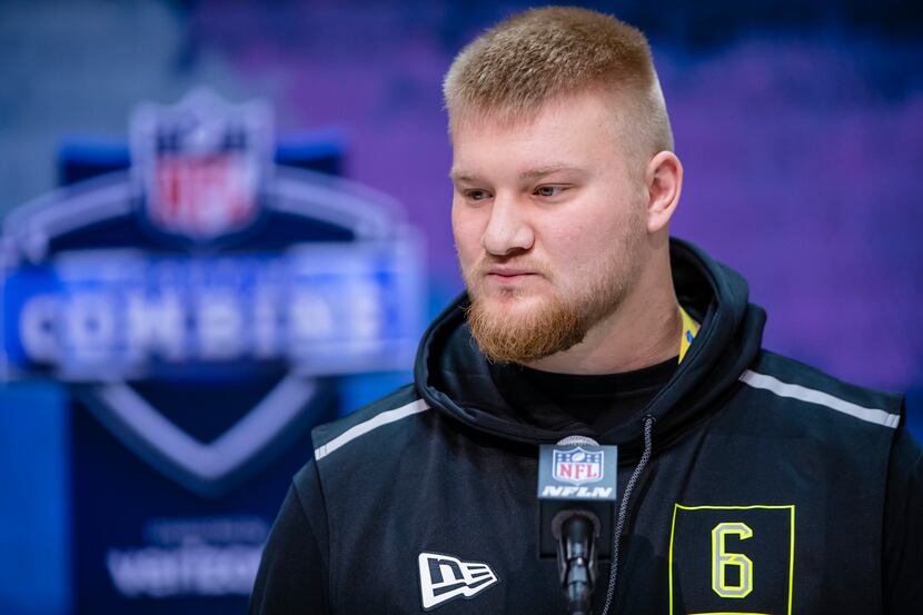 INDIANAPOLIS, IN - FEBRUARY 26: Tyler Biadasz #OL06 of the Wisconsin Badgers speaks to the...