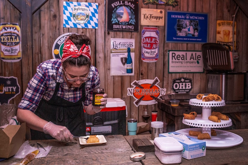 Pastry chef Nina Angelilli Conoley prepares cannoli during a fundraiser at the Ginger Man in...