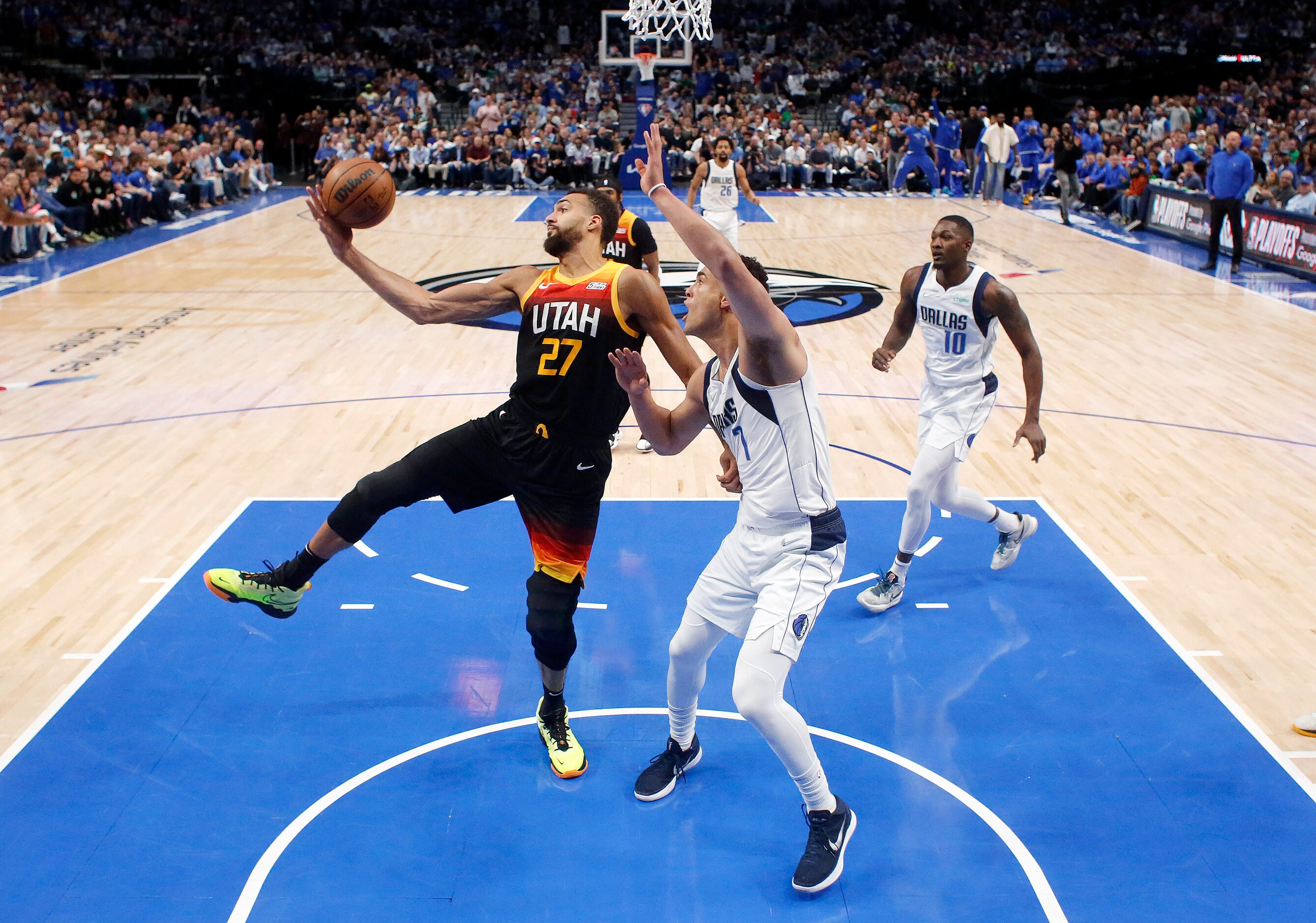 Utah Jazz center Rudy Gobert (27) and Dallas Mavericks center Dwight Powell (7) battle for a...