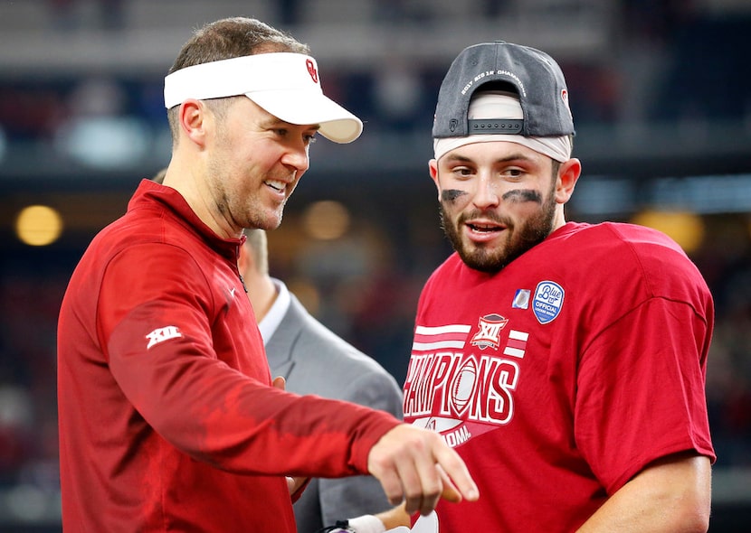 Oklahoma Sooners head coach Lincoln Riley and quarterback Baker Mayfield (6) celebrate their...