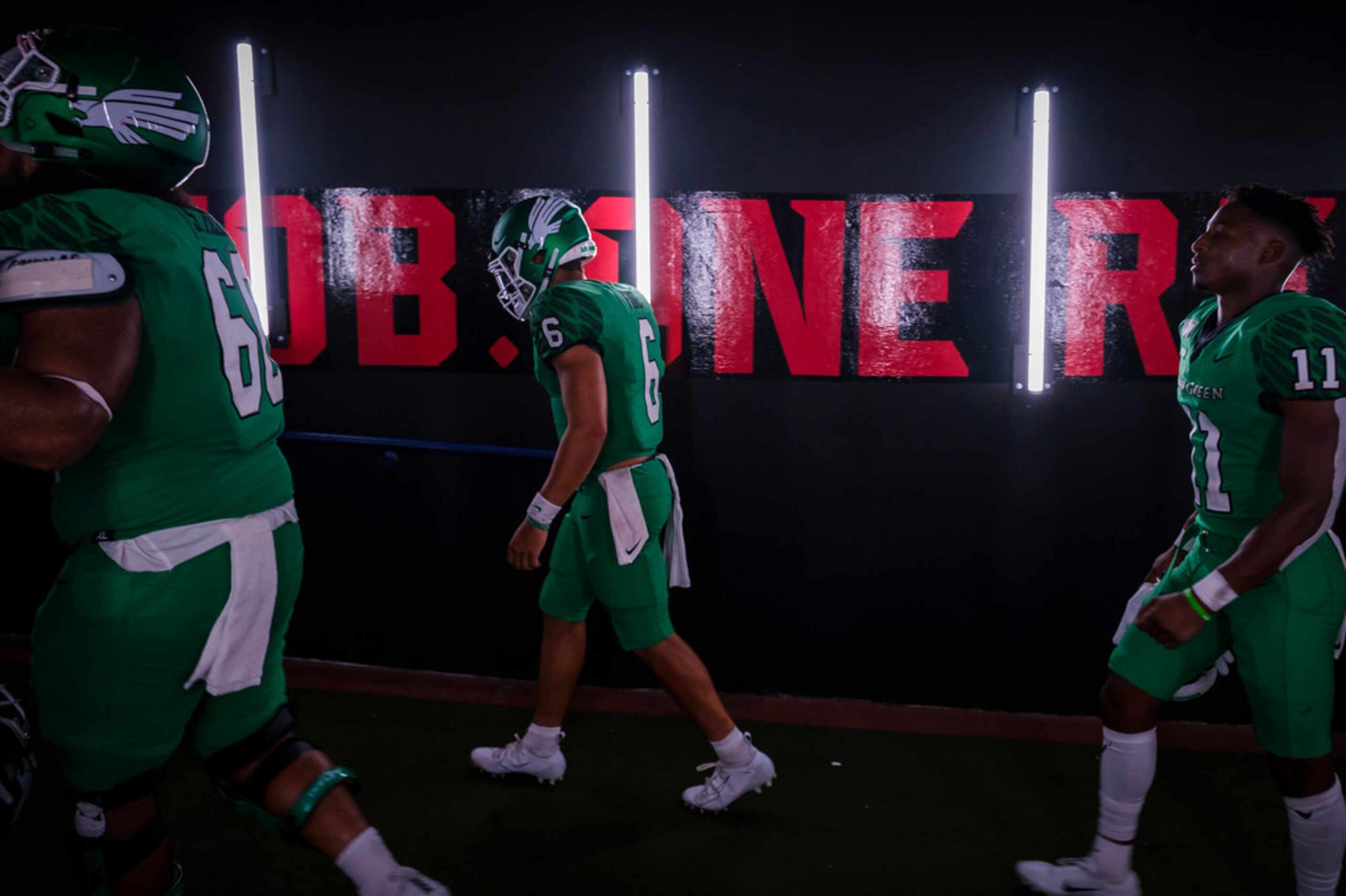 UNT quarterback Mason Fine (6) heads to the locker room after a 49-27 loss to SMU in an NCAA...