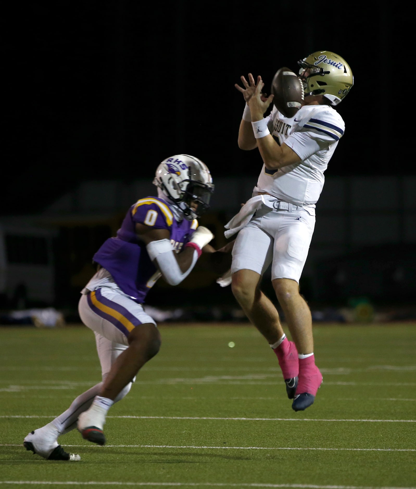 Jesuit quarterback Charlie Peters (9) is unable to make the catch on a double pass as...