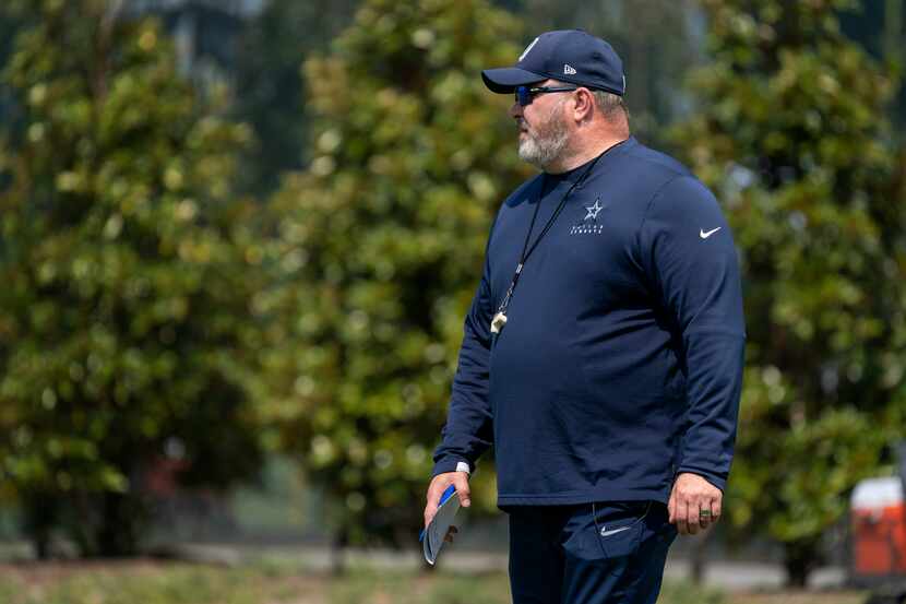 Dallas Cowboys head coach Mike McCarthy watches his team during a preseason practice,...