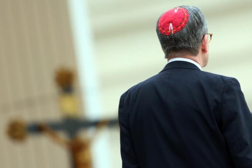 
A member of the Chicago’s Jewish Federation gathers in St. Peter’s Square to attend Pope...