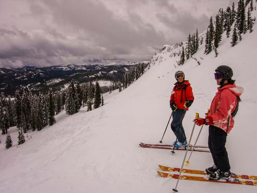 Skiers prepare to descend a trail at the Wolf Creek Ski Area east of Pagosa Springs, Colo. ...