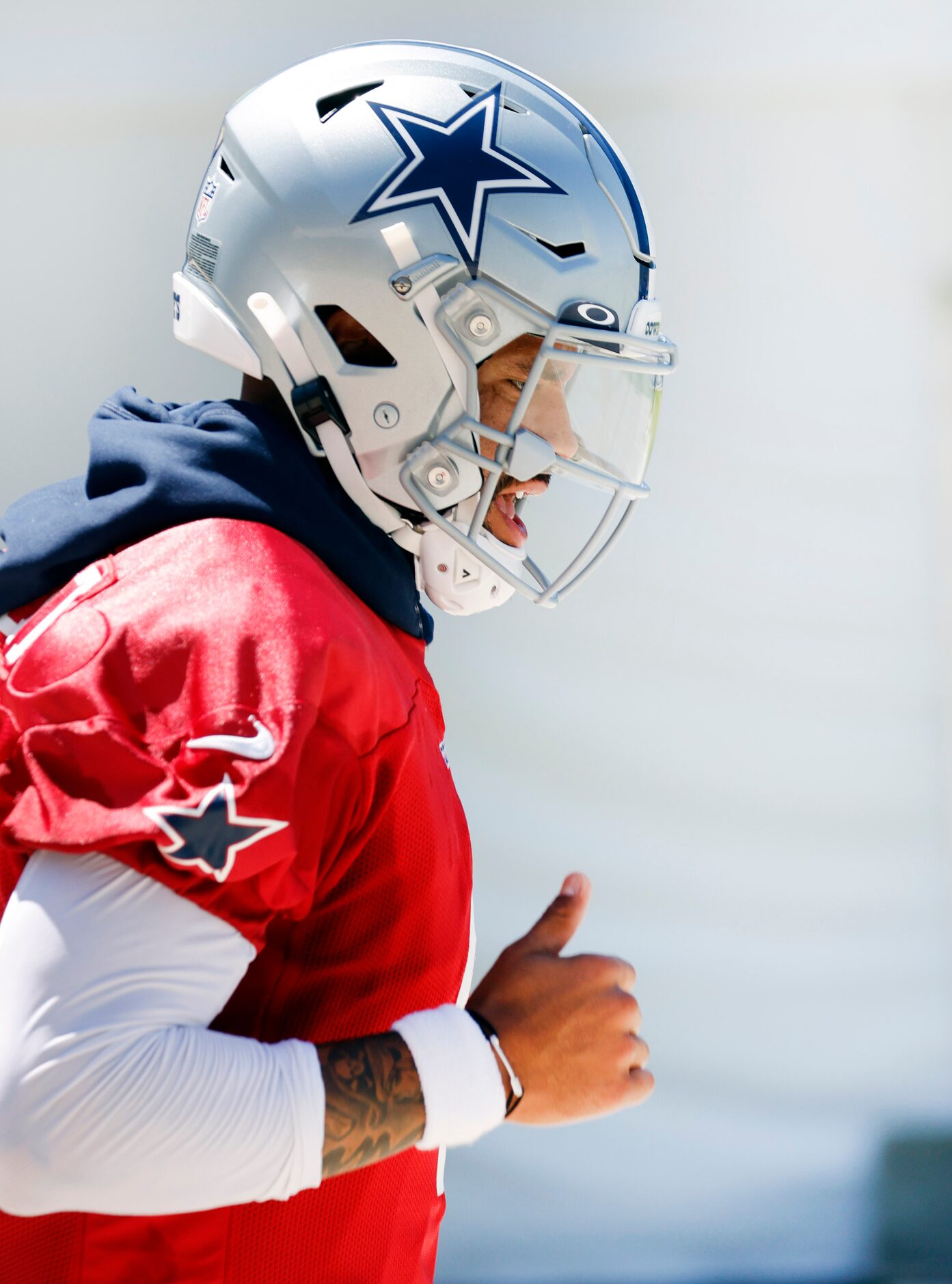 Dallas Cowboys quarterback Dak Prescott (4) jogs out to the field before Training Camp...