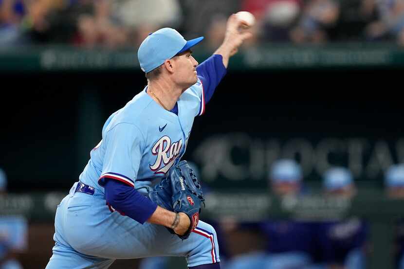 Texas Rangers relief pitcher Andrew Heaney throw to the Oakland Athletics in the fourth...