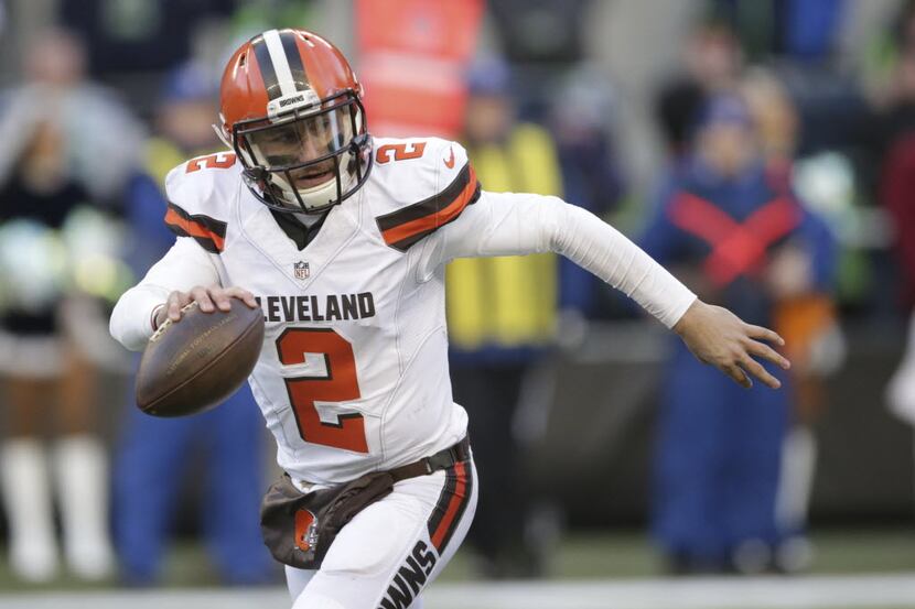 Browns quarterback Johnny Manziel looks to pass against the Seattle Seahawks in the second...