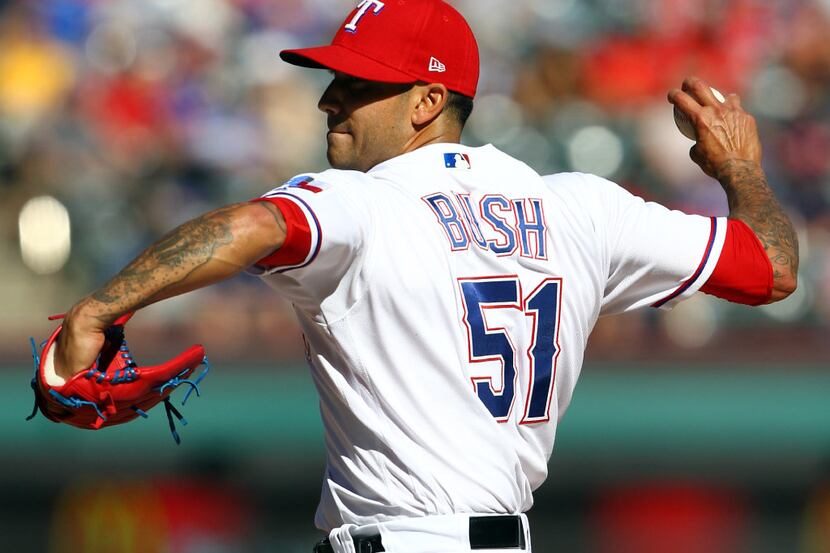 Texas Rangers relief pitcher Matt Bush (51) works in the ninth inning against the Kansas...