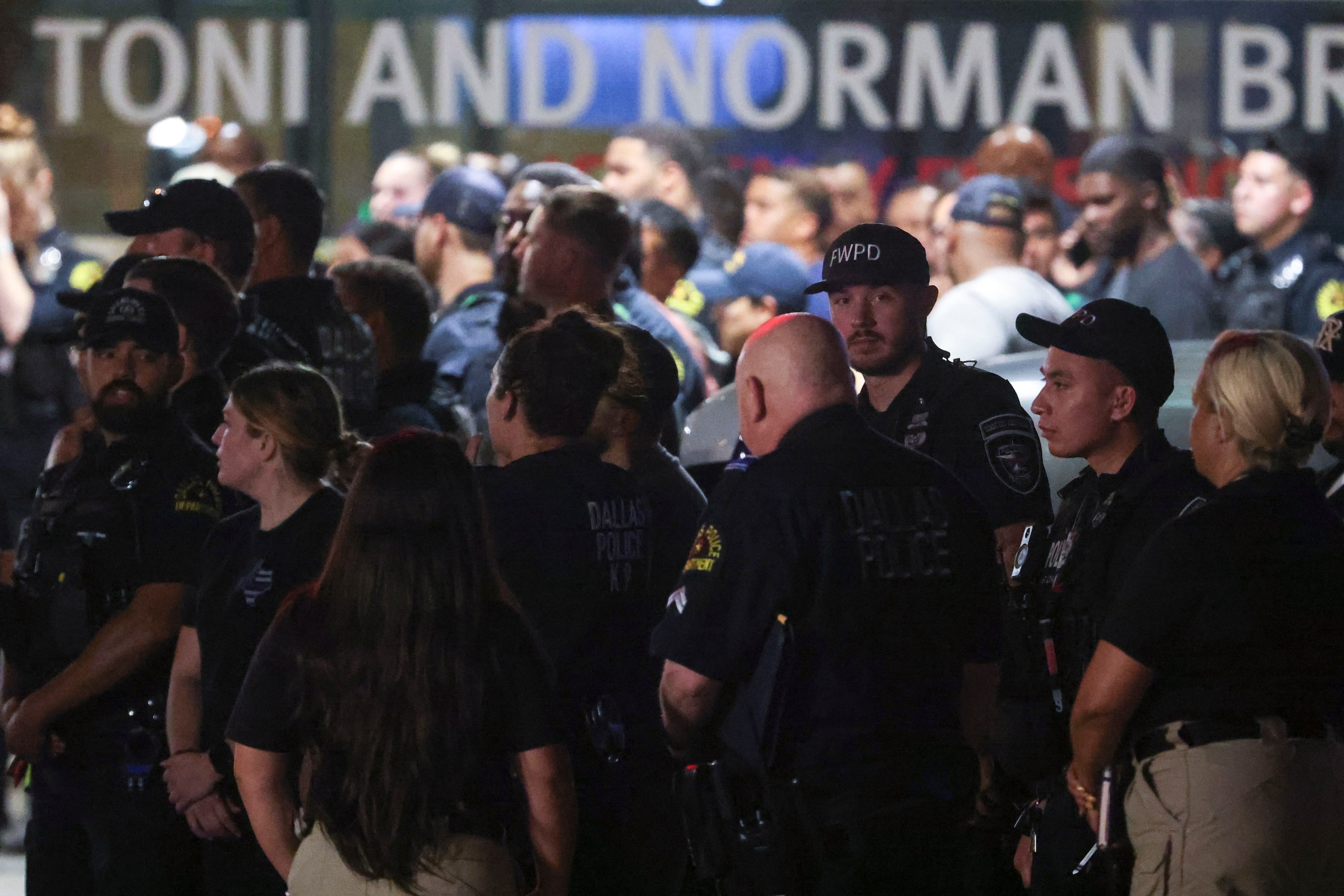 Dallas Police Department officers gather for a procession, on Friday, Aug. 30, 2024, at...