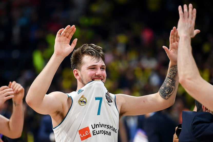 Real Madrid's Slovenian Luka Doncic celebrates their 85-80 win in the Euroleague Final Four...