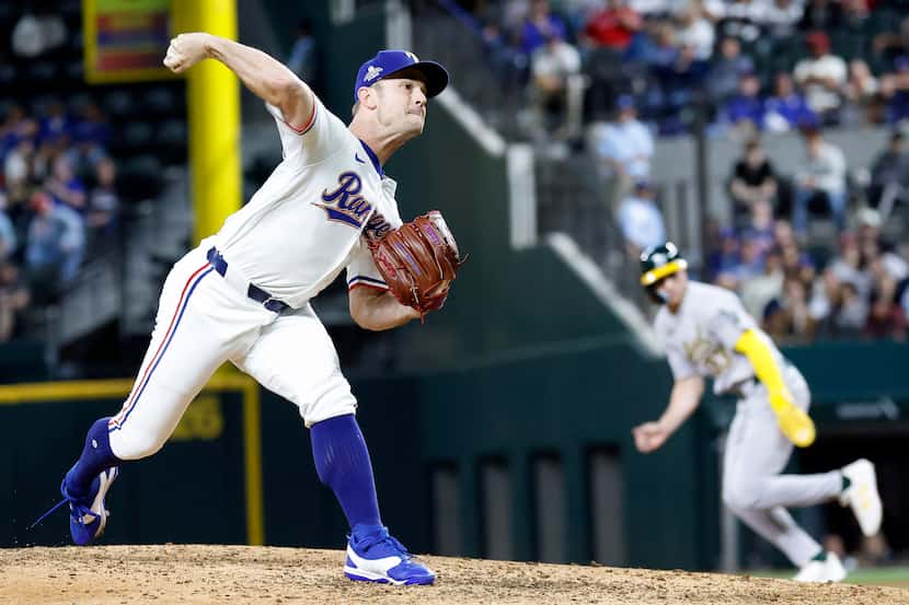 Texas Rangers pitcher David Robertson (37) throws in the eighth inning against the Oakland...