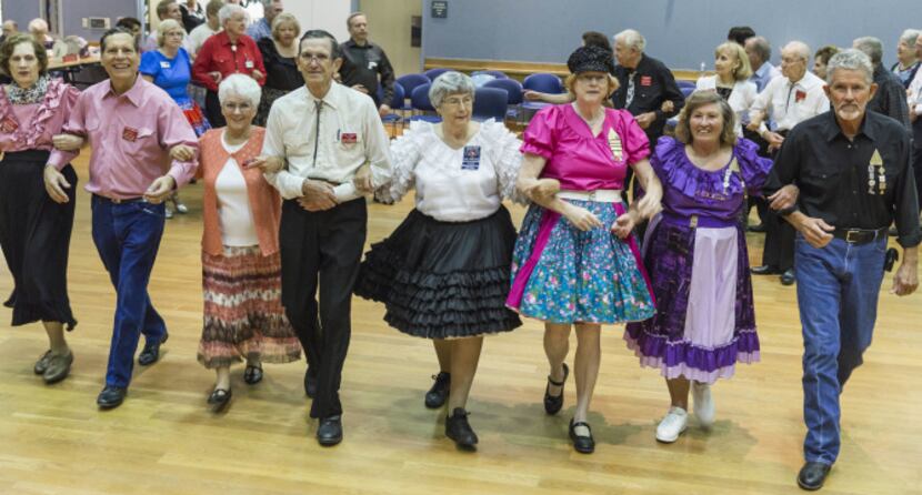 Dancers during the "Grand March" at the Dixie Chainers Square and Round Dance Club at the...