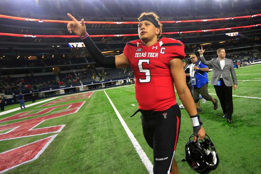 Texas Tech quarterback Patrick Mahomes II celebrates after Tech defeated Baylor in an NCAA...