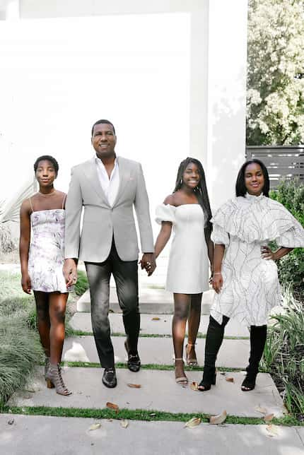 Fred Perpall with his daughters, Ava (left) and Ali, and his wife, Abi, in front of their...