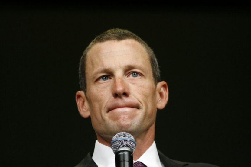 FILE - This Aug. 24, 2009 file photo shows Lance Armstrong during the opening session of the...