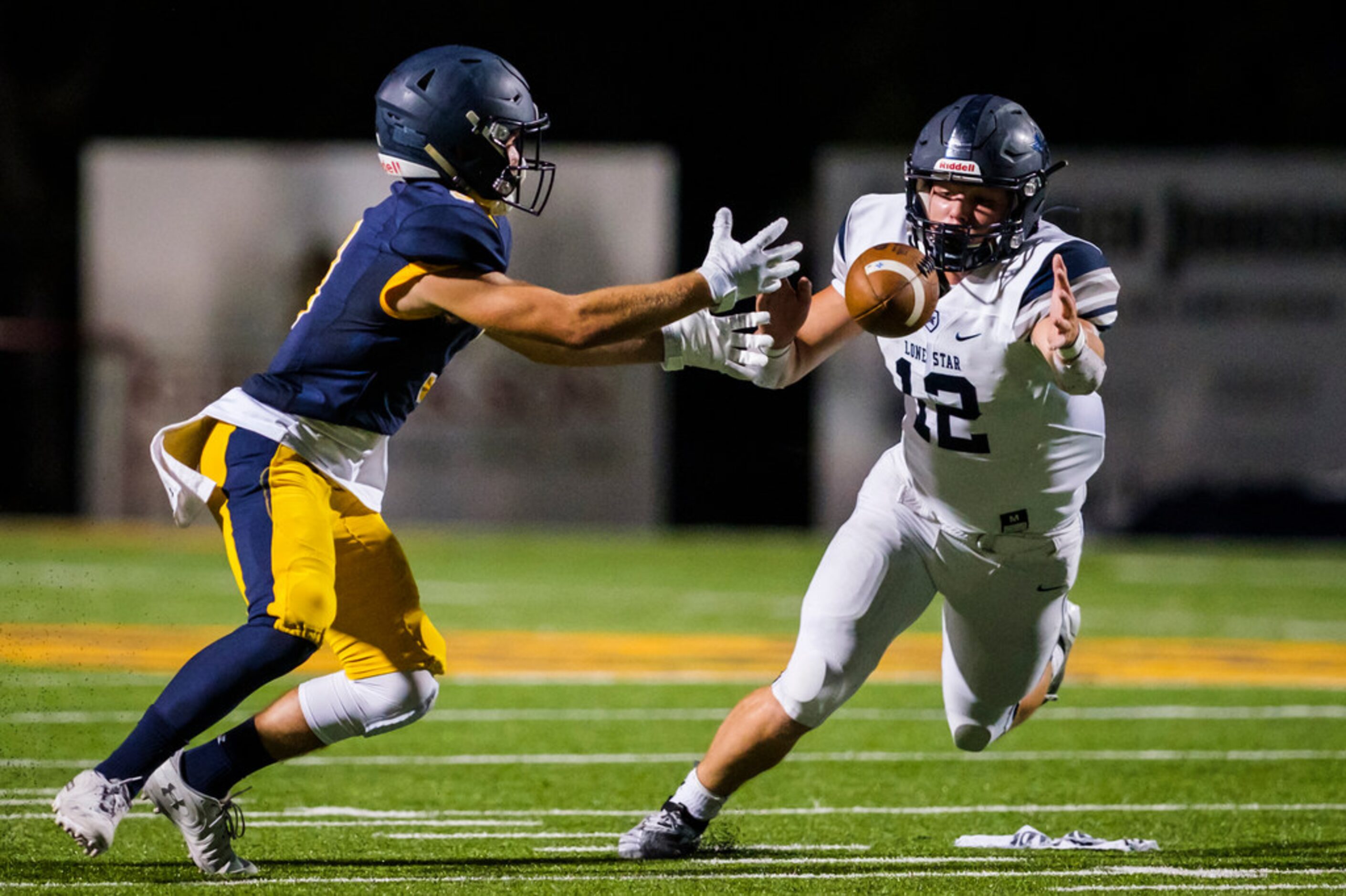 Frisco Lone Star linebacker Blake Gotcher (12) intercepts a pass off the hands of Highland...