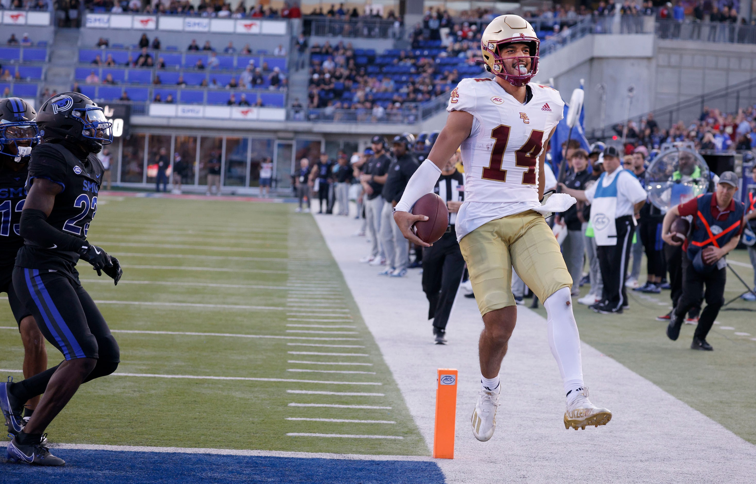 Boston College quarterback Grayson James (14) scores a touchdown over SMU during the second...