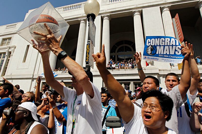 Fans cheer in front of Union Station during the 2011 Dallas Mavericks NBA World Championship...
