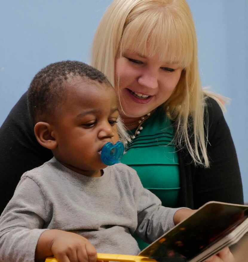 
Angela Swindell, an early learning specialist with Educational First Steps, works with...