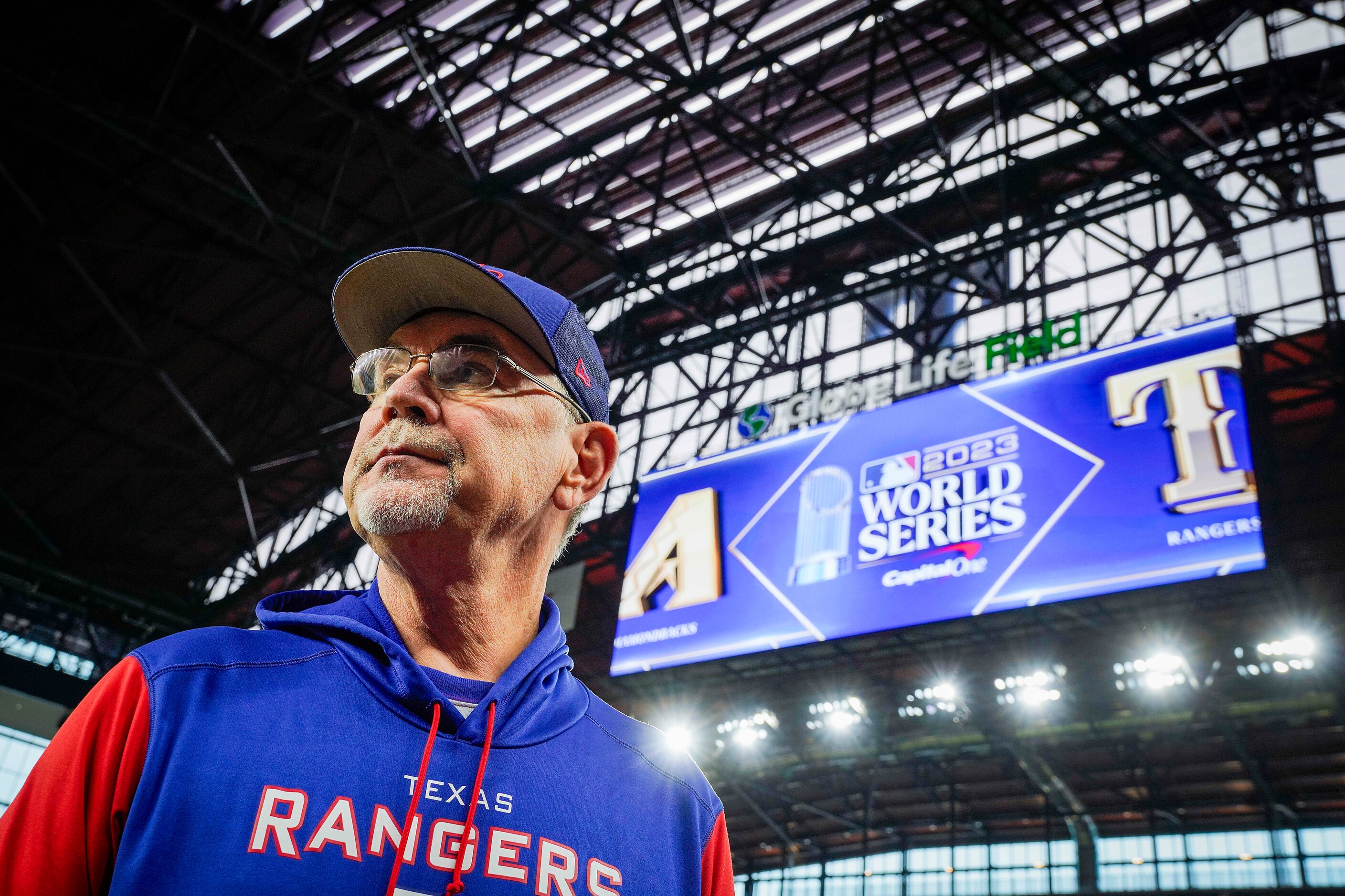 Texas Rangers manager Bruce Bochy looks out over the stadium during a team workout at Globe...