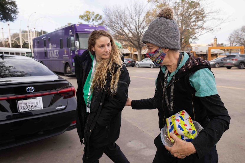 Terra Carden, street outreach care minister for OurCalling, leads Sandy Huudang to the...