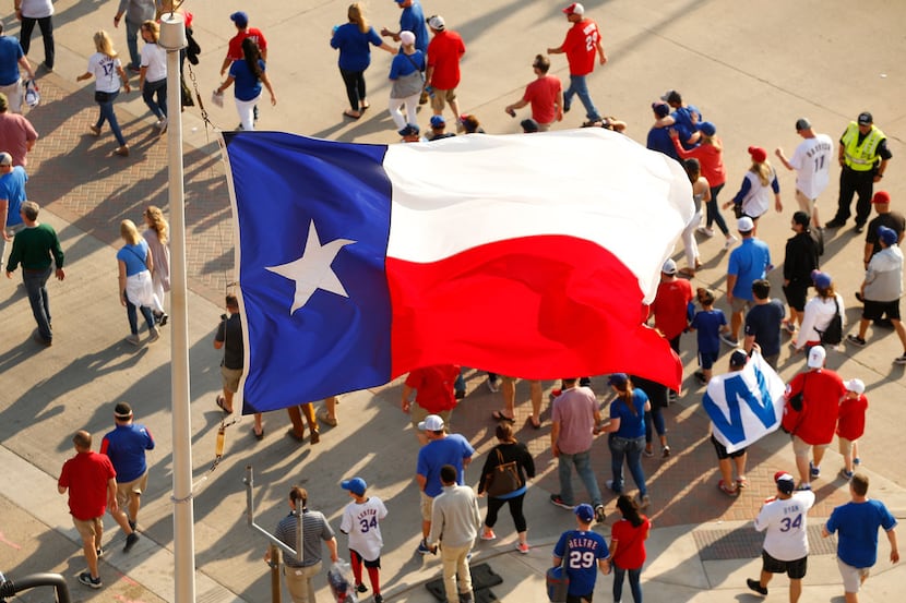 Texas Rangers fans leave early from Globe Life Park in Arlington, Thursday, March 28, 2019....