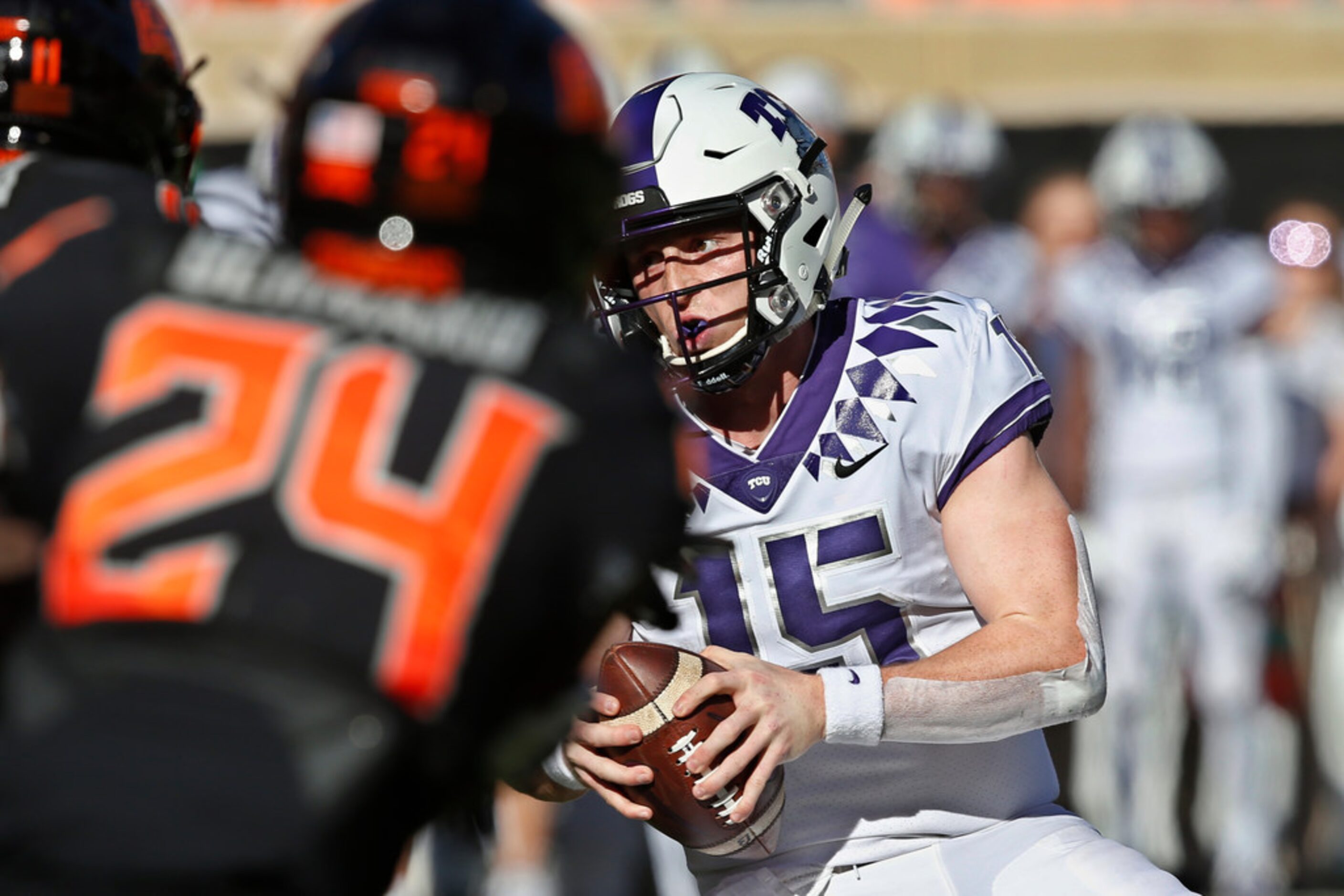 TCU quarterback Max Duggan (15) carries for a touchdown in the first half of an NCAA college...