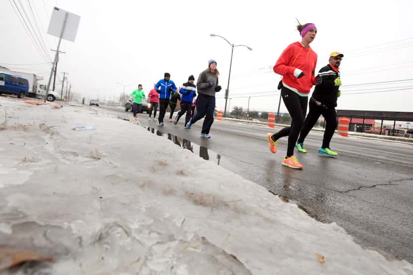 A group of half and full marathon runners, led by Jessica Riley, 31, of Tatum, Texas, and...