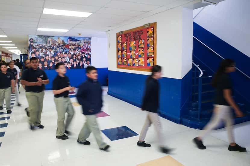 Students made their way to class at La Fe Preparatory School in El Paso on March 29, 2019.