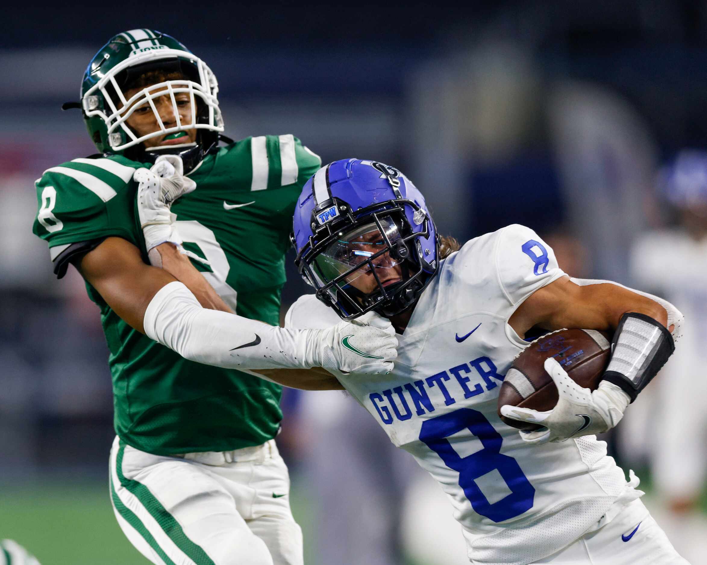 Gunter running back Ethan Sloan (8) runs through the arms of Franklin defensive back Devyn...