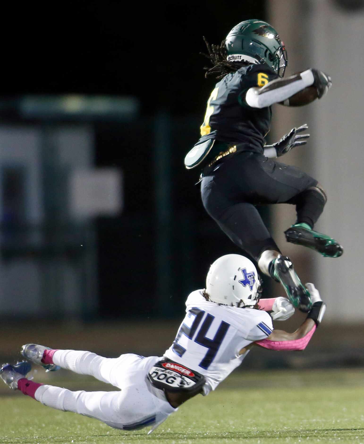 High Flying DeSoto Eagles running back Robert Richardson (6) took the high road enroute to a...