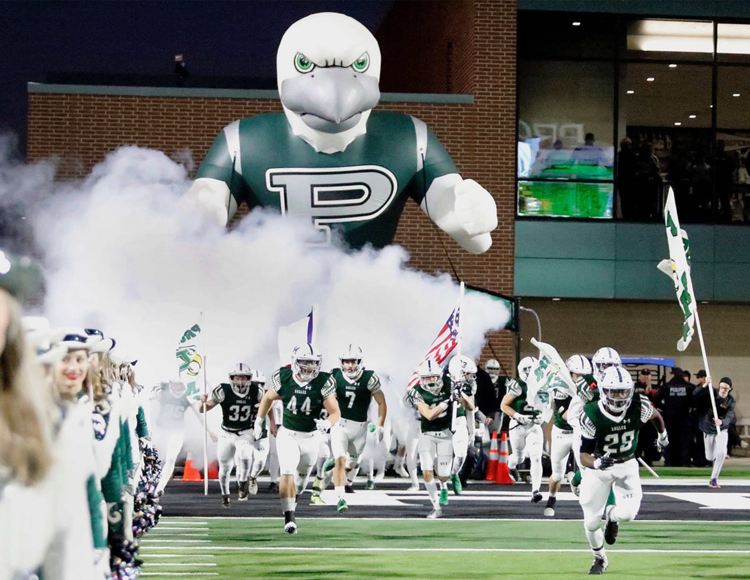 Prosper High School takes the field before kickoff as Prosper High School hosted Allen High...