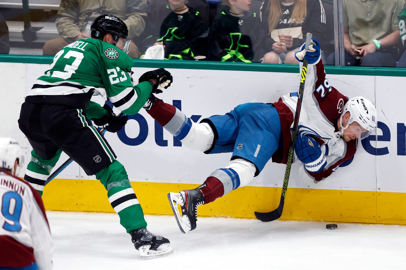 Dallas Stars defenseman Esa Lindell (23) hits Colorado Avalanche left wing Artturi Lehkonen...