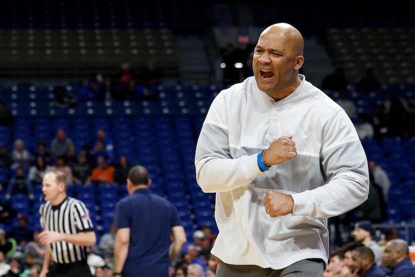 Duncanville head coach David Peavy celebrates during the fourth quarter of a Class 6A state...