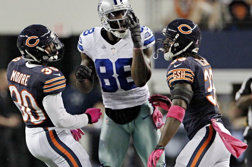 Dallas Cowboys wide receiver Dez Bryant (88) calls back to officials as he complains about...