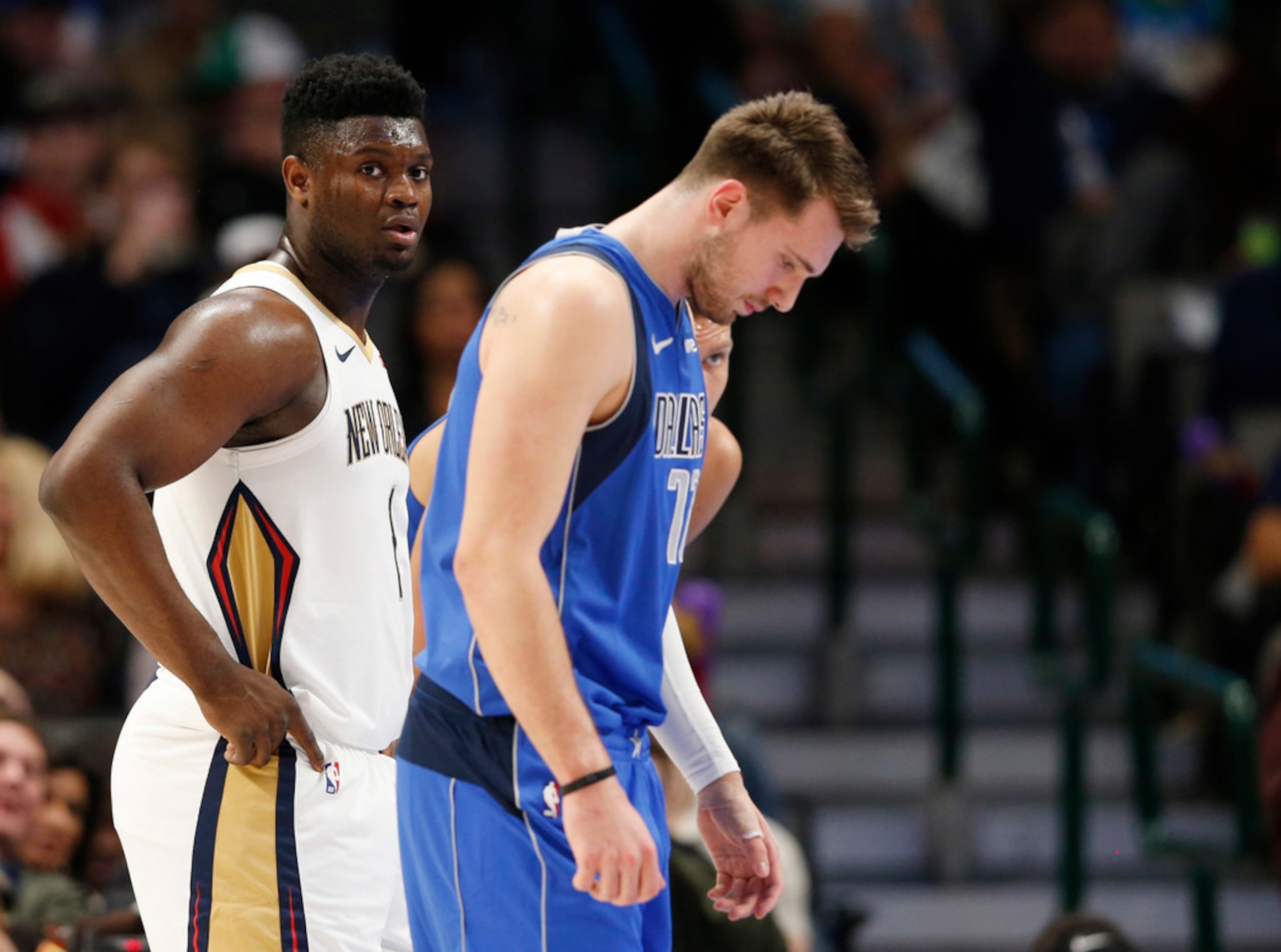 Dallas Mavericks guard Luka Doncic (77) and New Orleans Pelicans forward Zion Williamson (1)...