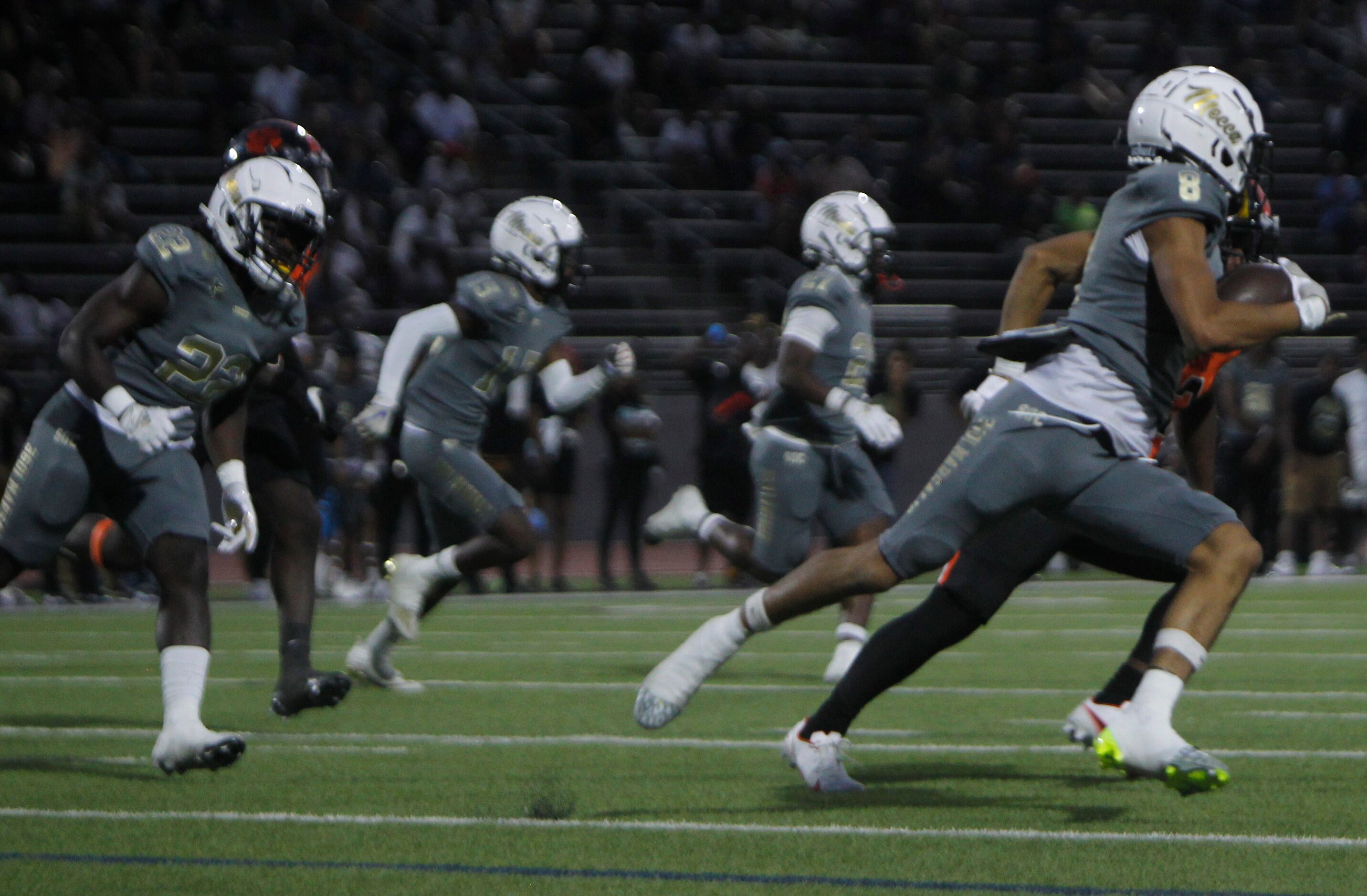 South Oak Cliff receiver Eli Baesa (8) returns a kickoff during first half action against...