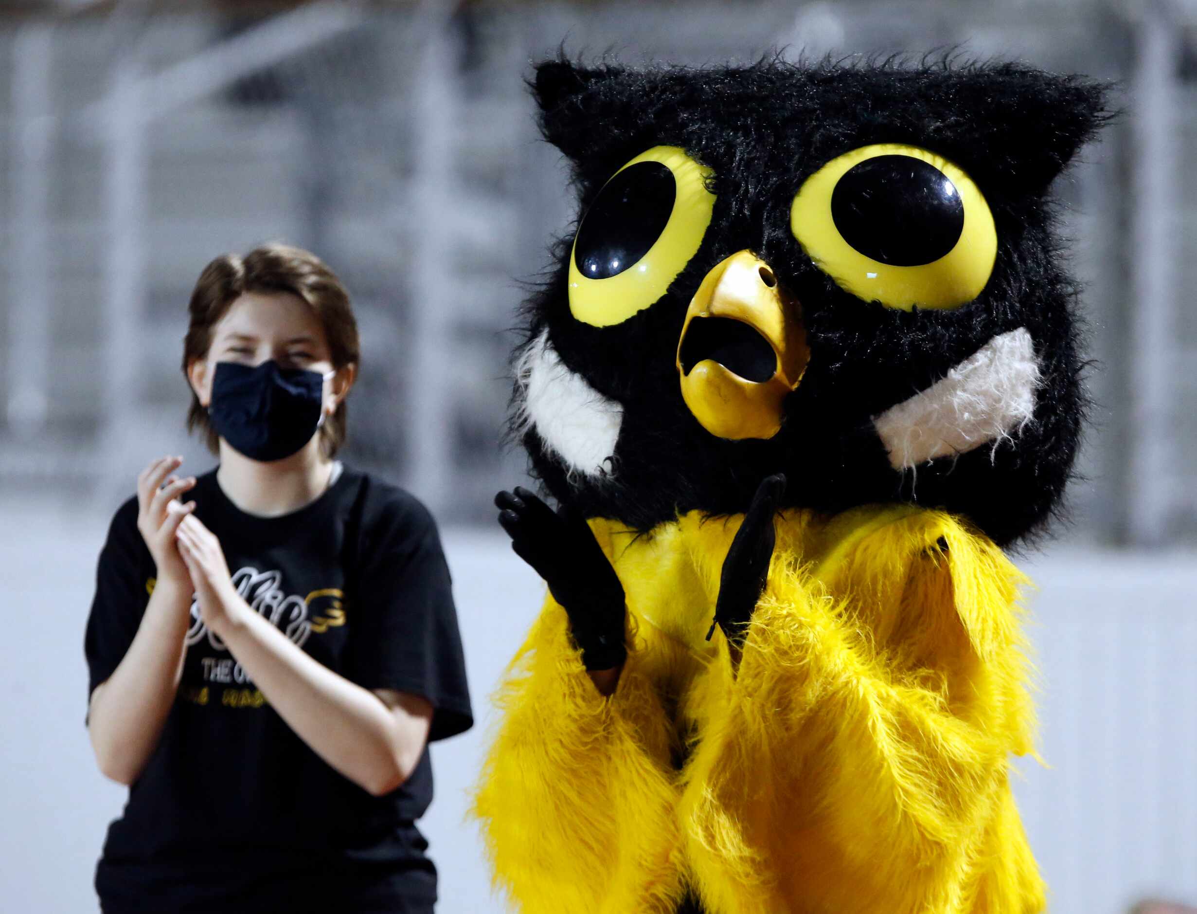 The Garland High Owl mascot on the sideline gives a “hoot” who will win during the first...
