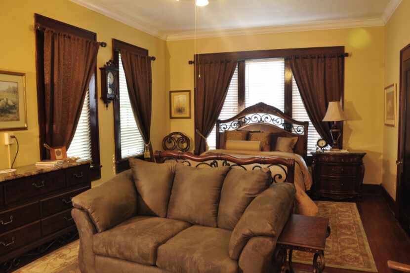  The Mansion on Sawmill Lake's Whippoorwill Suite features luxurious furnishings and a...