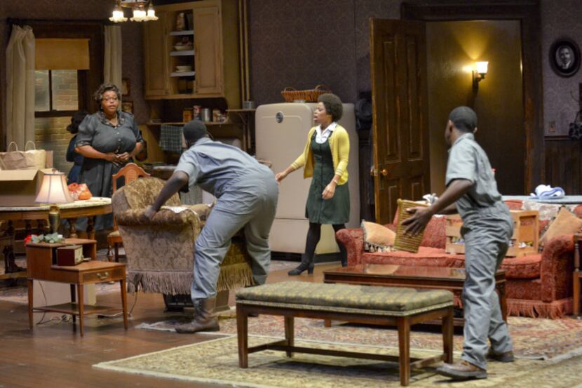 McClendon Giles (far right) stars in the Dallas Theater Center's production of "A Raisin in...