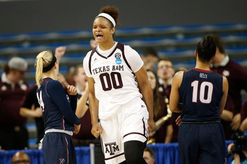 Texas A&M center Khaalia Hillsman celebrates after being fouled and still making her shot...